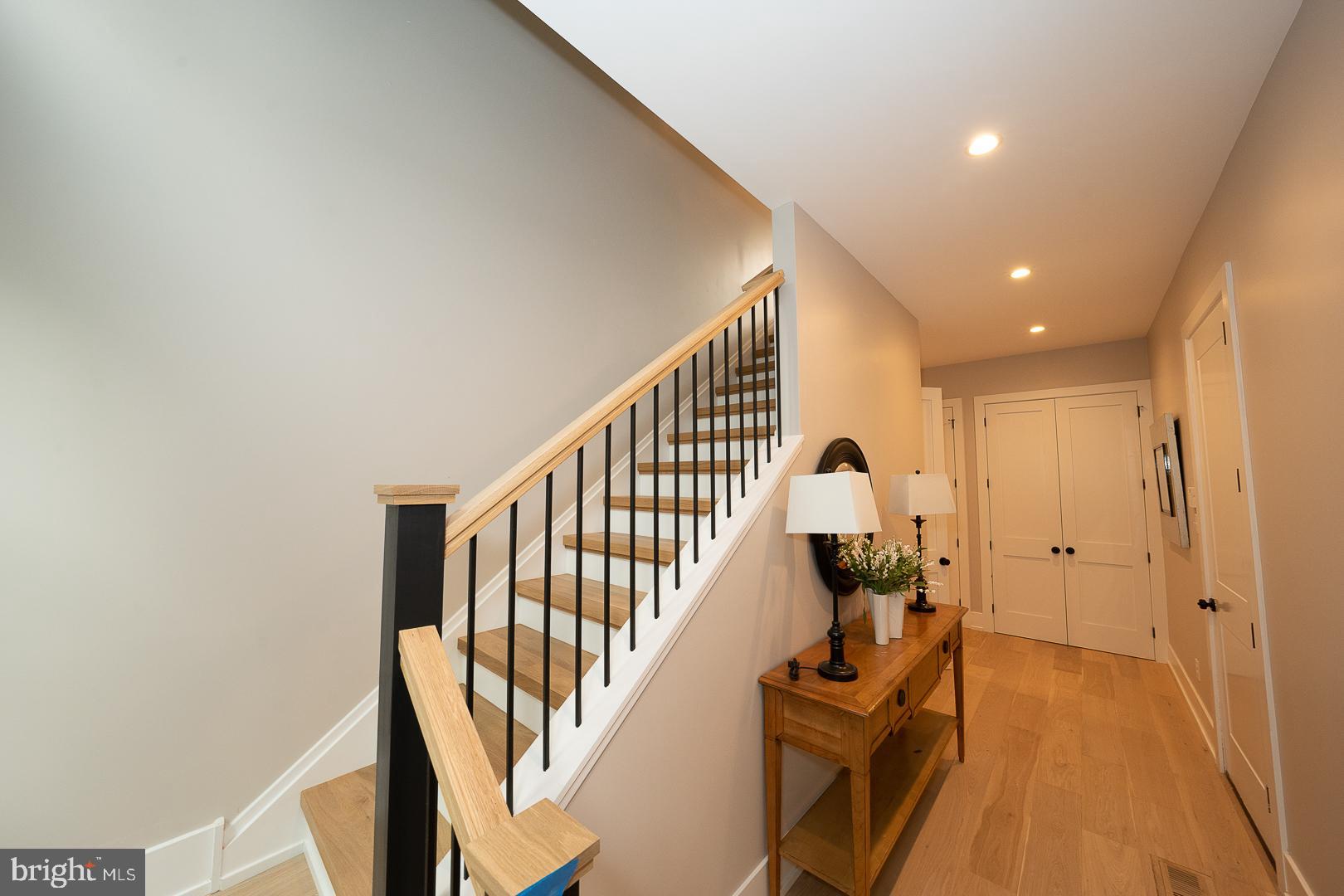 187 South Spring Mill Road Villanova, PA 19085 - Photo 23 of 53 a hallway with wooden floor and stairs