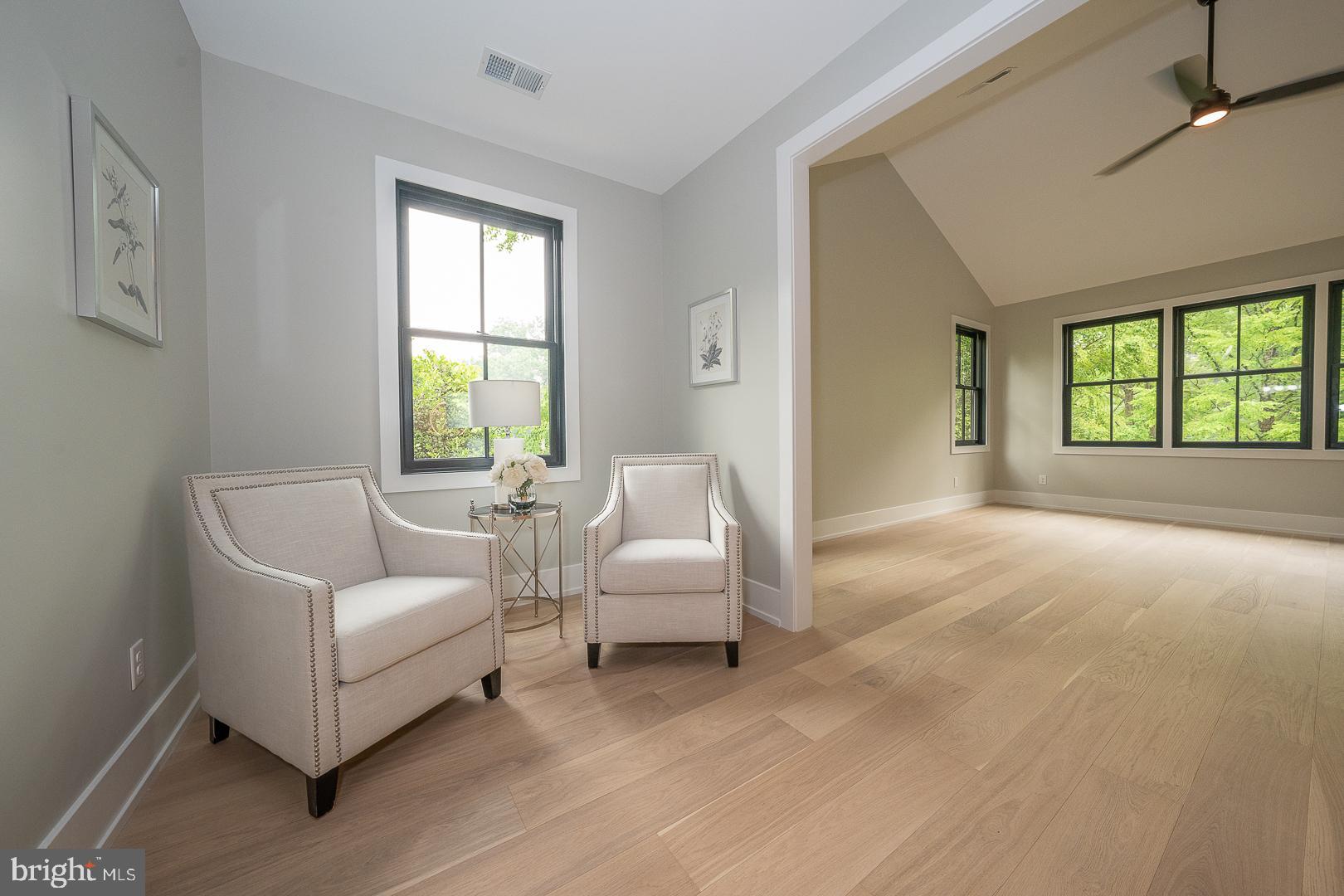 187 South Spring Mill Road Villanova, PA 19085 - Photo 27 of 53 a living room with furniture and a large window