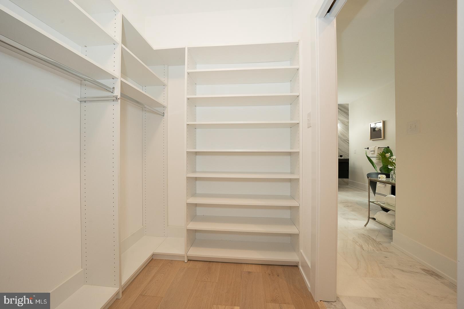 187 South Spring Mill Road Villanova, PA 19085 - Photo 30 of 53 a view of walk in closet with empty racks