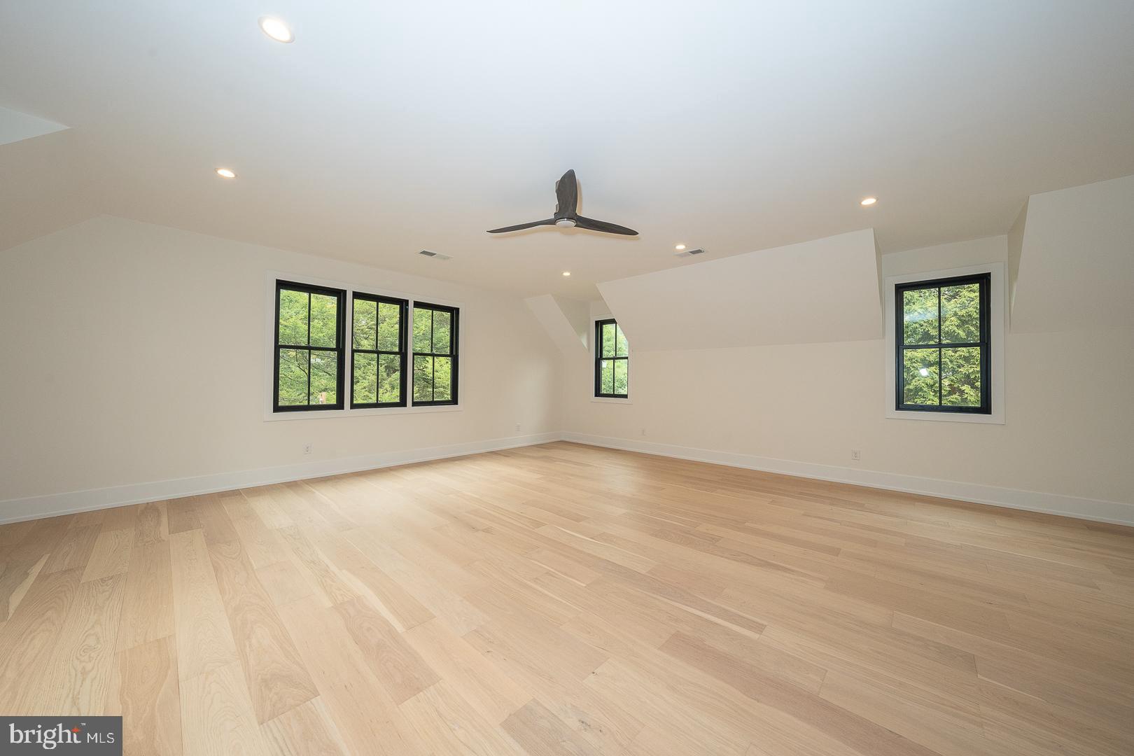 187 South Spring Mill Road Villanova, PA 19085 - Photo 38 of 53 an empty room with windows and closet