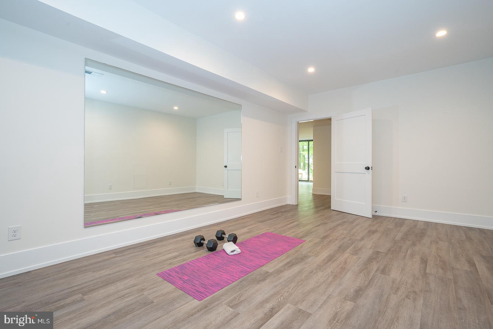 187 South Spring Mill Road Villanova, PA 19085 - Photo 48 of 53 a view of a room with wooden floor and bench