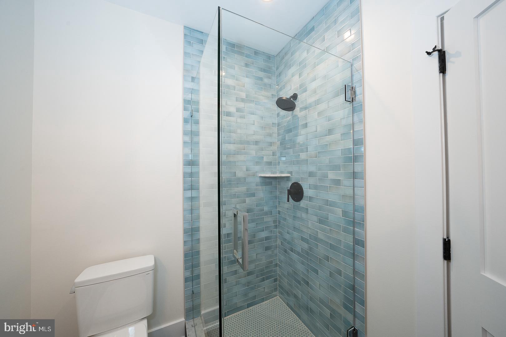187 South Spring Mill Road Villanova, PA 19085 - Photo 49 of 53 a bathroom with a shower and toilet
