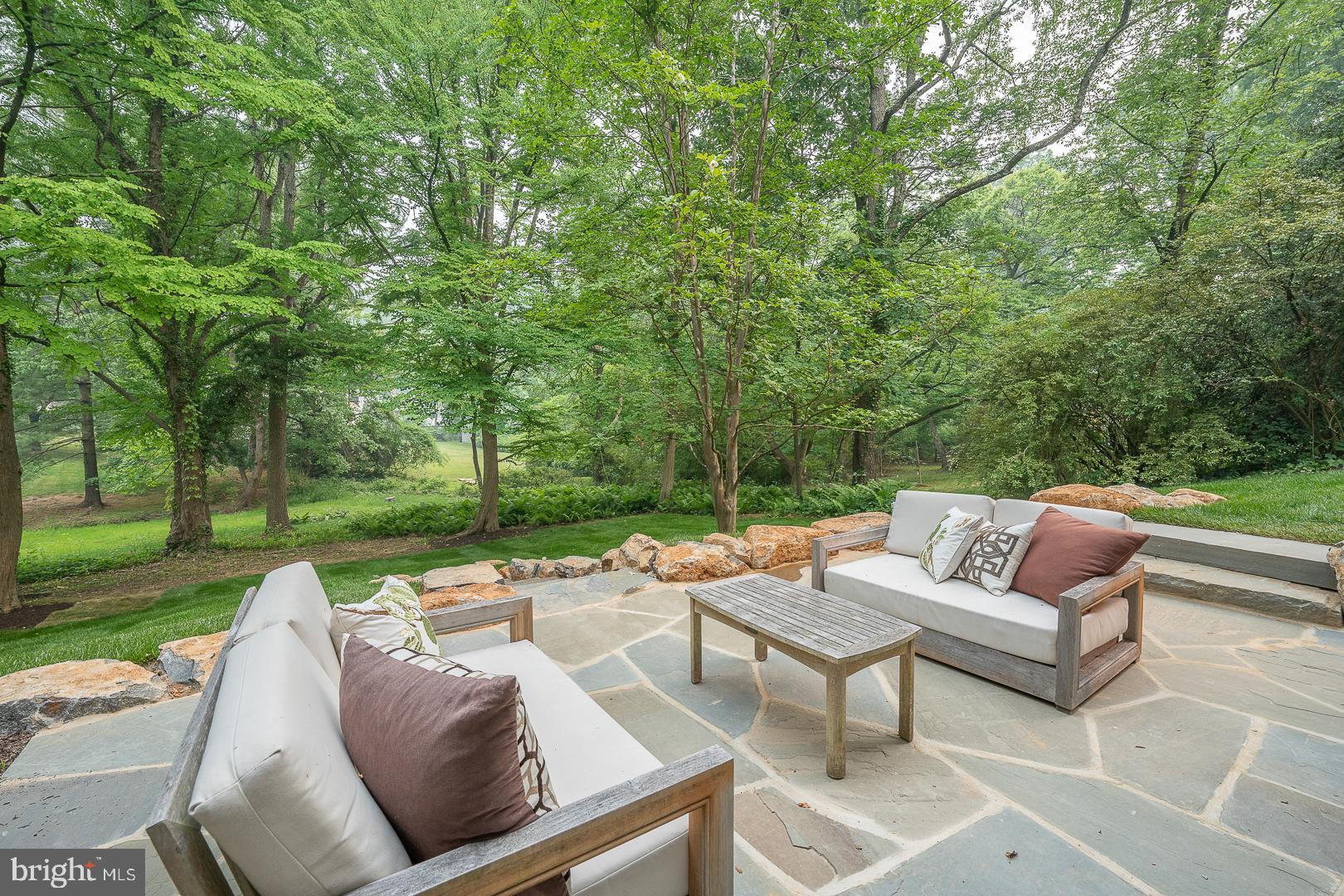 187 South Spring Mill Road Villanova, PA 19085 - Photo 51 of 53 a view of patio with couches and a fire pit