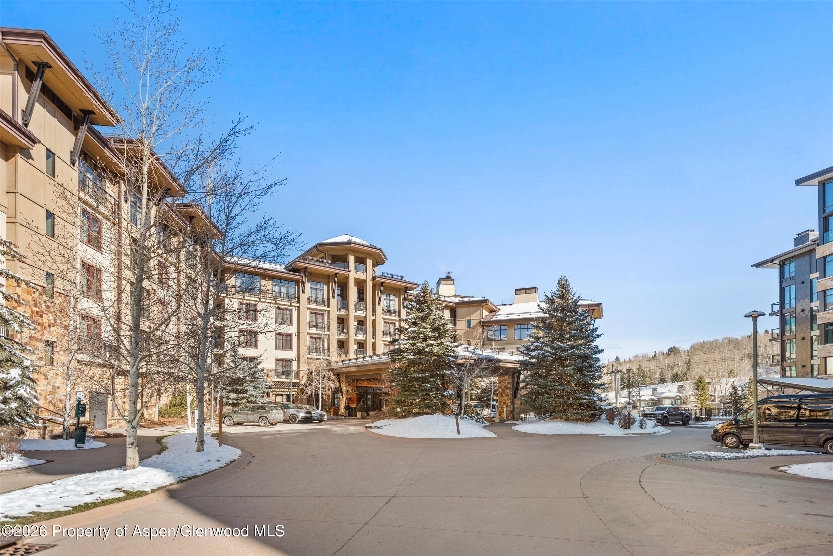 130 Wood Road, Unit 716 Snowmass Village, CO 81615 - Photo 1 of 12 a view of city with tall buildings