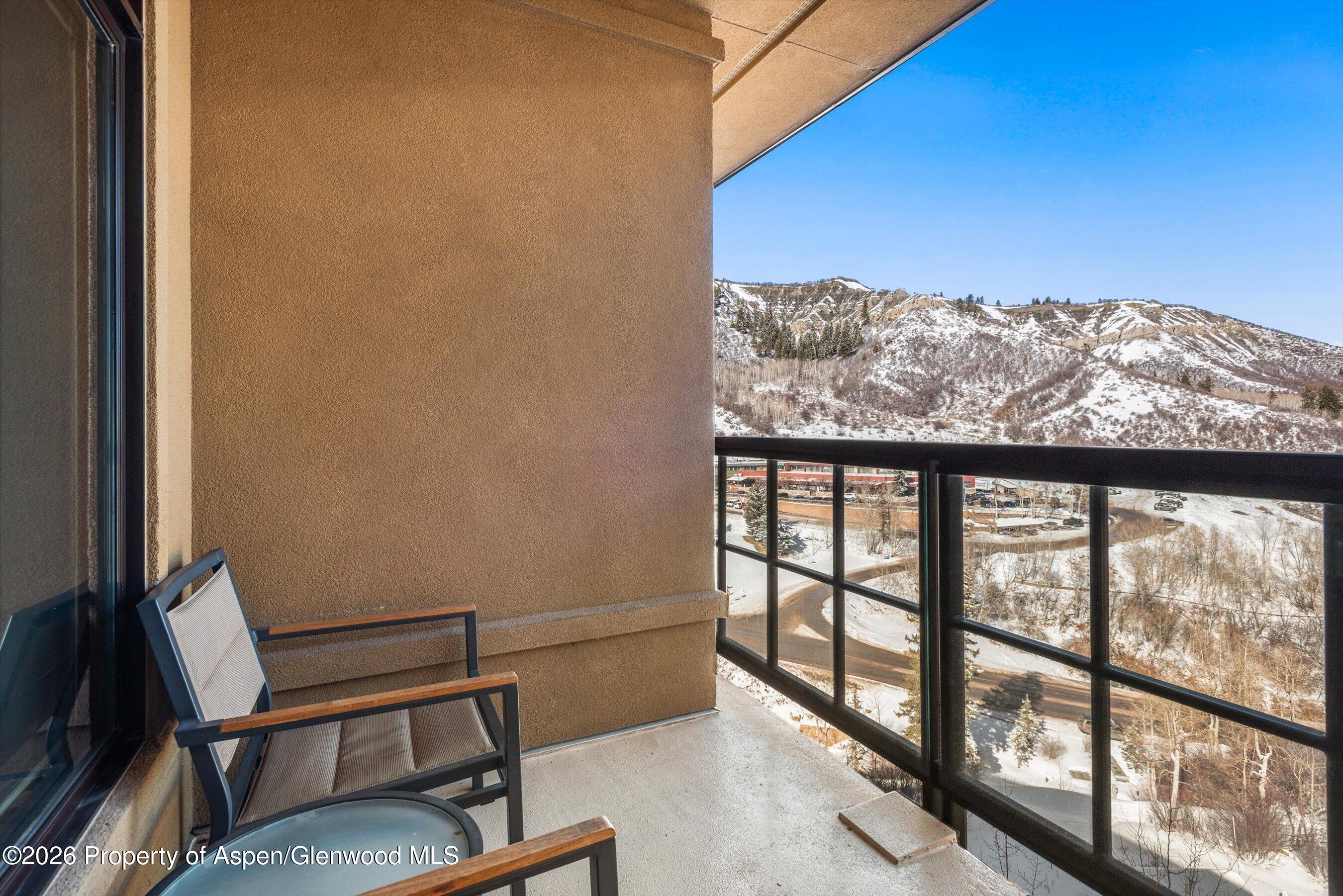 130 Wood Road, Unit 716 Snowmass Village, CO 81615 - Photo 5 of 12 a view of a city from a balcony