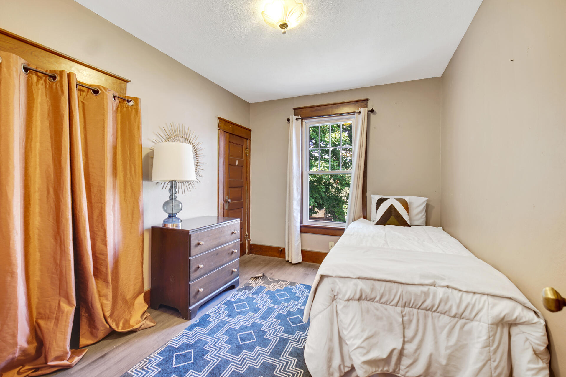 1524 Monroe Street La Porte, IN 46350 - Photo 17 of 32 a living room with furniture and a window