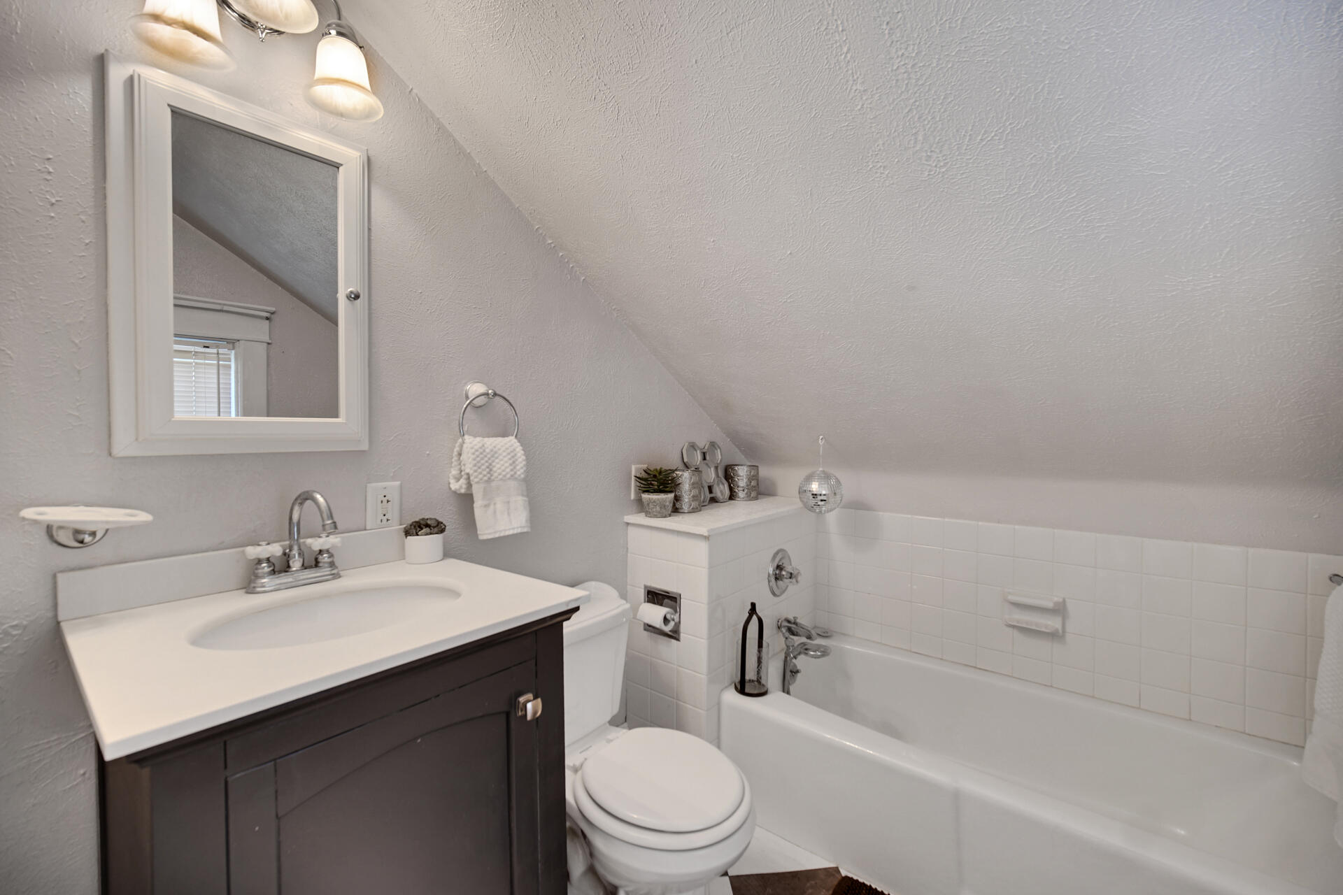 1524 Monroe Street La Porte, IN 46350 - Photo 18 of 32 a bathroom with a sink toilet vanity and bathtub