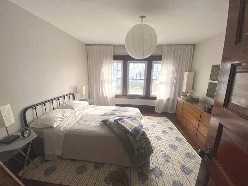 1524 Monroe Street La Porte, IN 46350 - Photo 22 of 32 a bed sitting in a bedroom next to a window