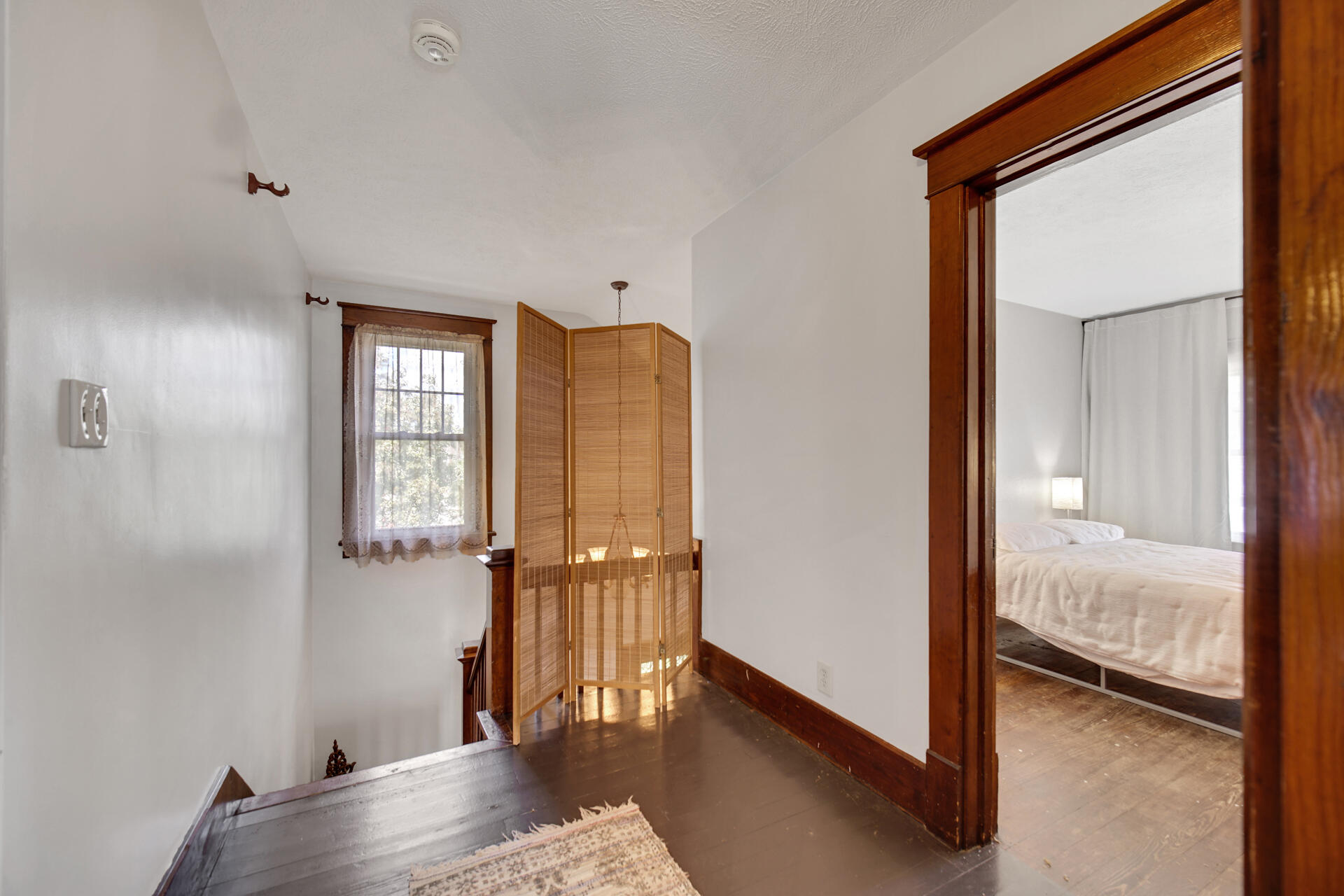 1524 Monroe Street La Porte, IN 46350 - Photo 25 of 32 a view of bedroom with wooden floor