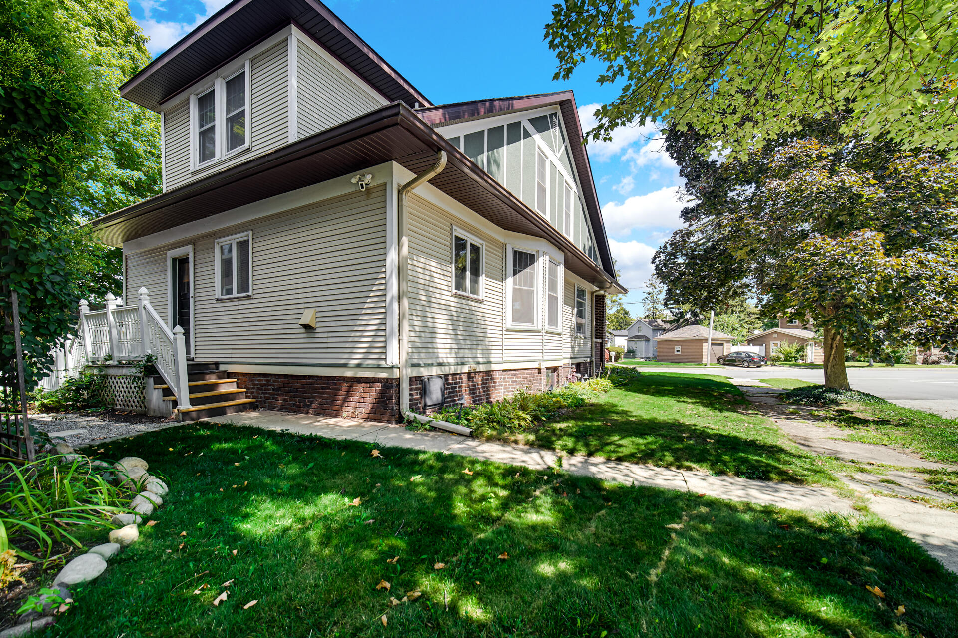 1524 Monroe Street La Porte, IN 46350 - Photo 32 of 32 a front view of a house with a yard and trees