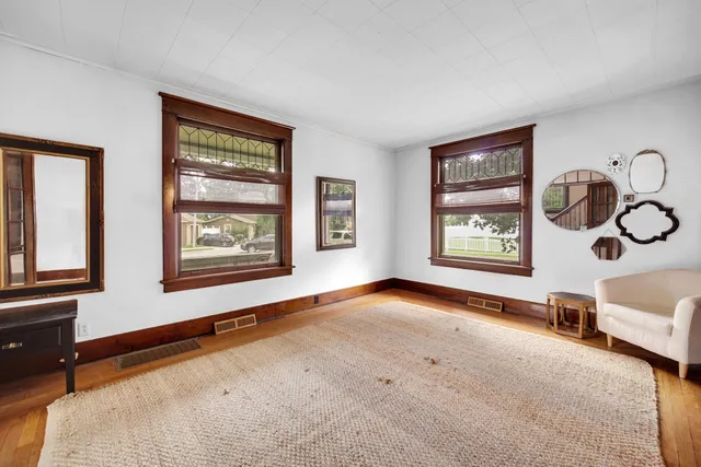 a view of livingroom with furniture and window