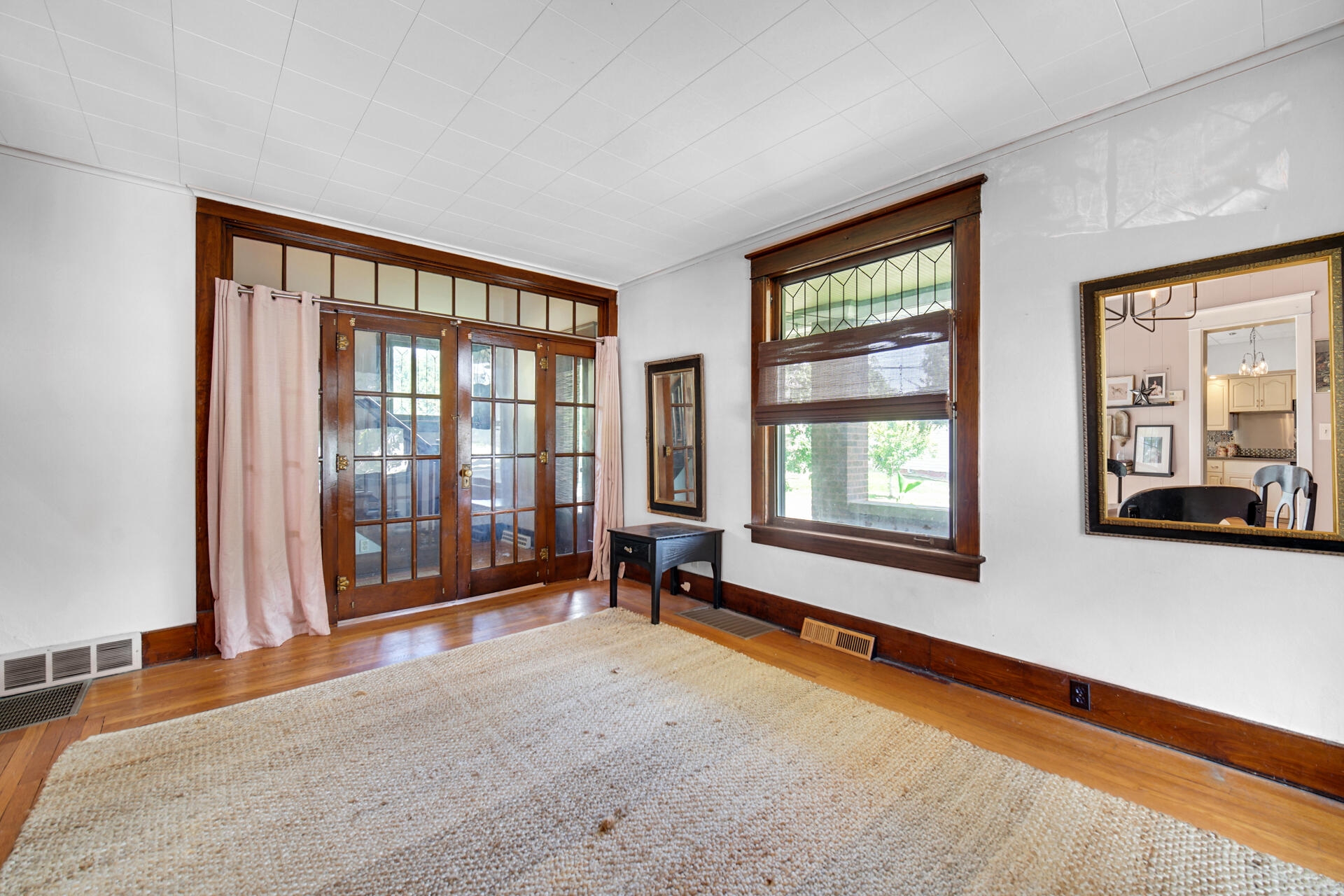 1524 Monroe Street La Porte, IN 46350 - Photo 5 of 32 a living room with hardwood floor and large window