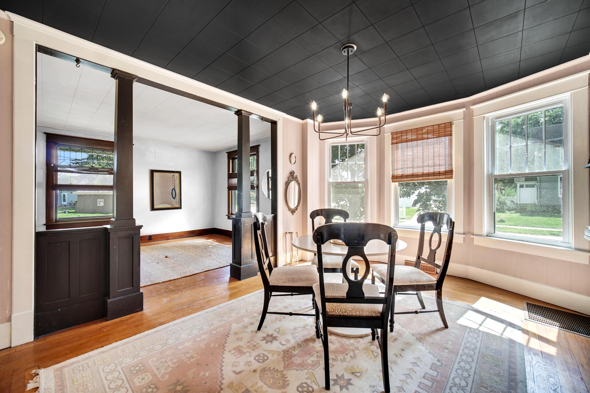 1524 Monroe Street La Porte, IN 46350 - Photo 7 of 32 a dining room with furniture window wooden floor