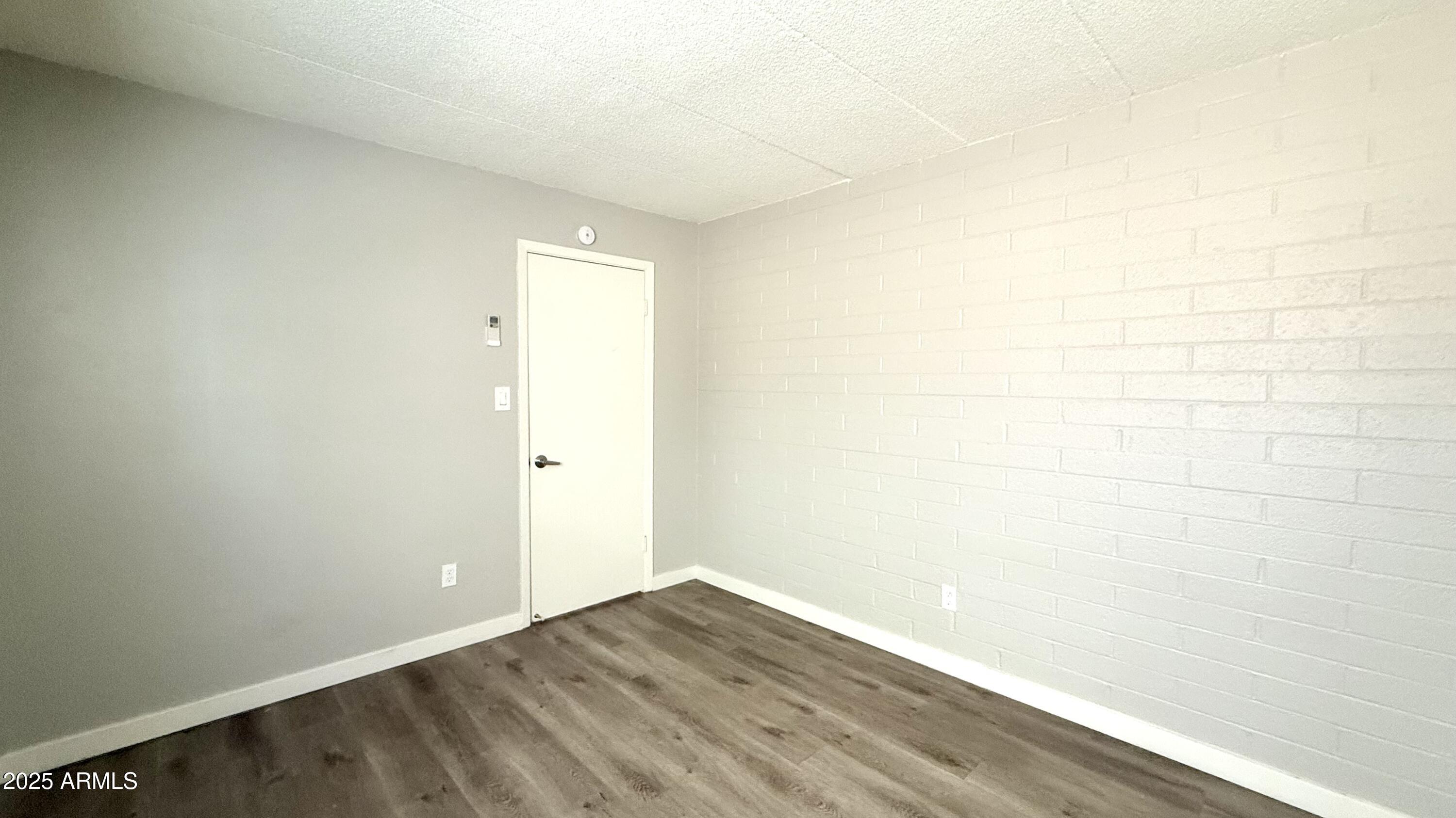 44 East Roanoke Avenue, Unit 4 Phoenix, AZ 85012 - Photo 18 of 19 a view of an empty room