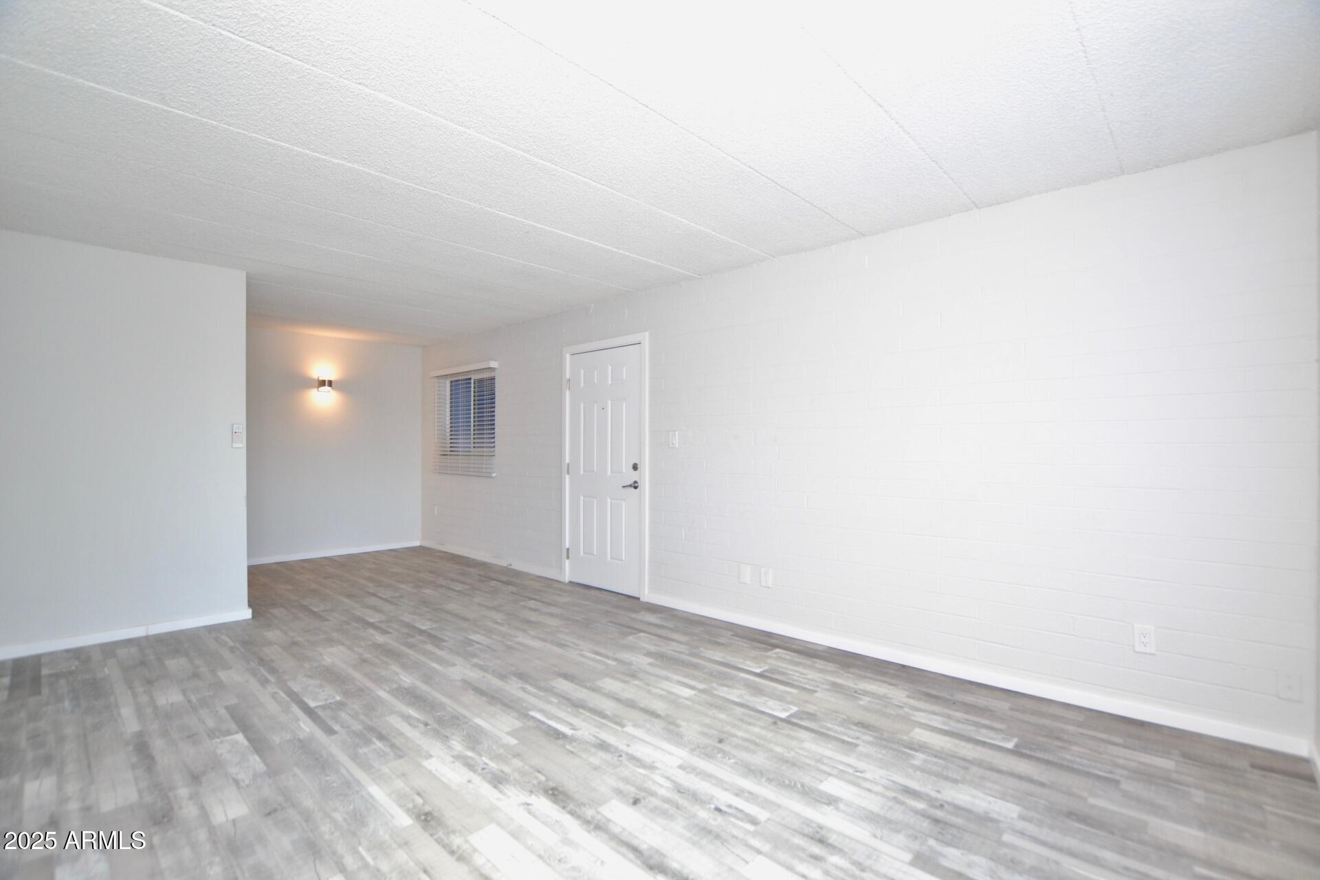 44 East Roanoke Avenue, Unit 4 Phoenix, AZ 85012 - Photo 5 of 19 a view of an empty room