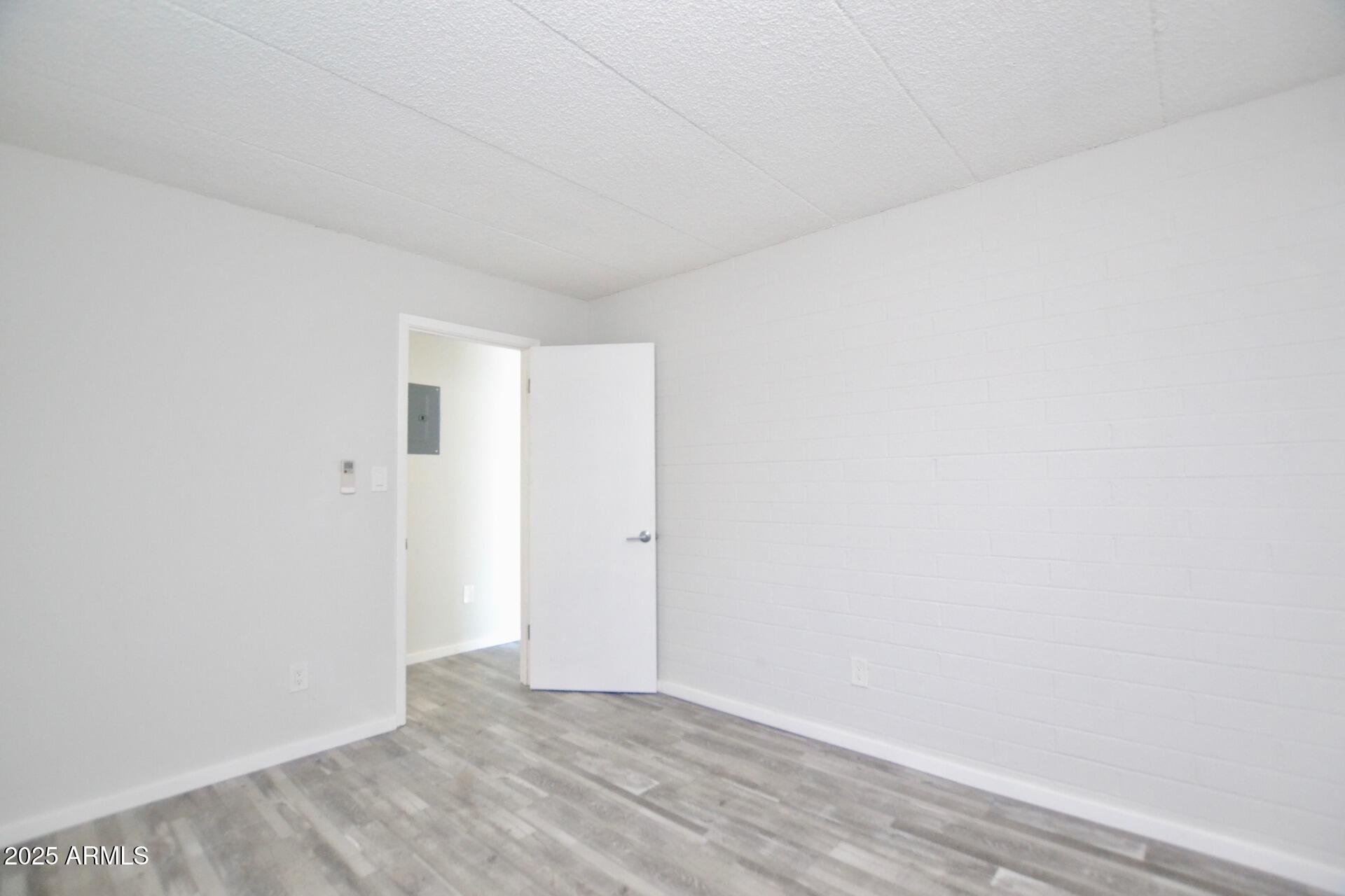 44 East Roanoke Avenue, Unit 4 Phoenix, AZ 85012 - Photo 7 of 19 a view of an empty room