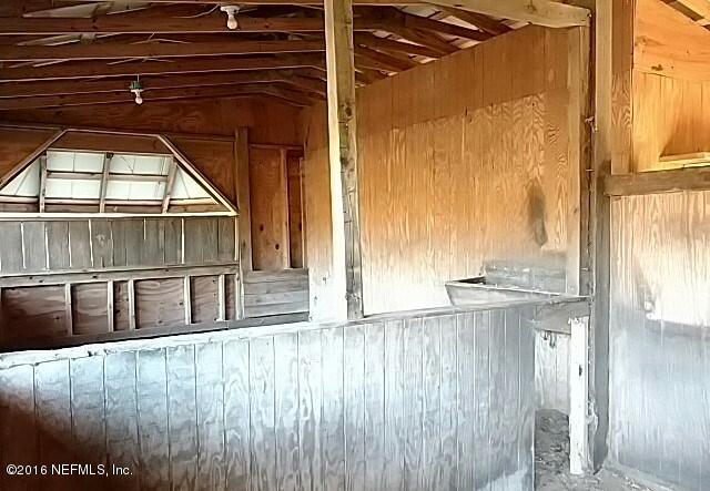 97065 Addison Place Yulee, FL 32097 - Photo 11 of 13 HORSE STABLES