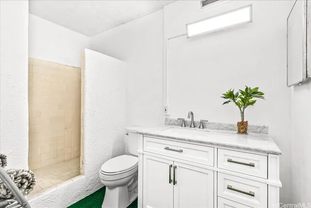 a living room with furniture and a christmas tree