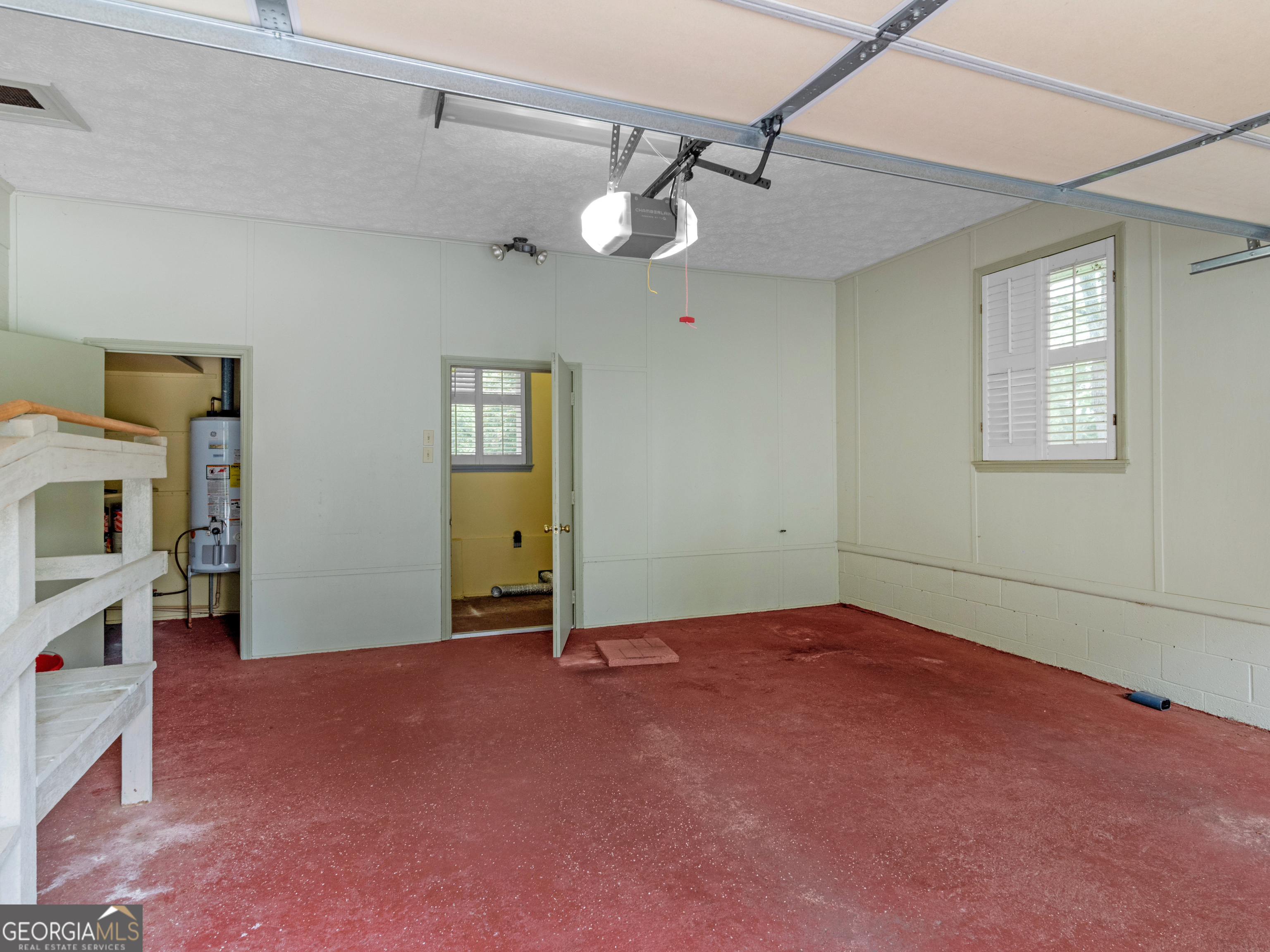 105 Zebulon Street Milner, GA 30257 - Photo 19 of 34 a view of an empty room with closet and a window