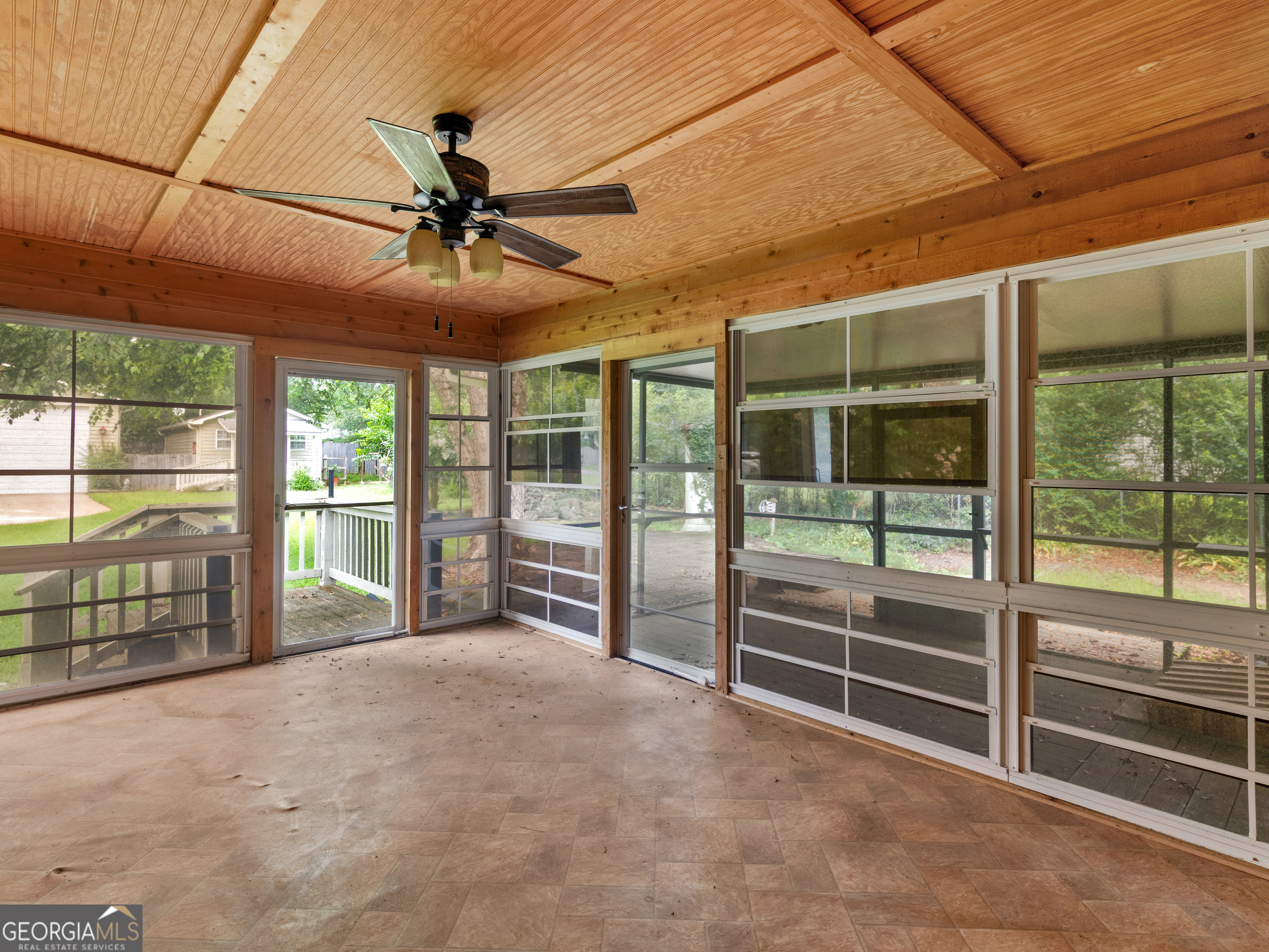 105 Zebulon Street Milner, GA 30257 - Photo 21 of 34 an empty room with windows