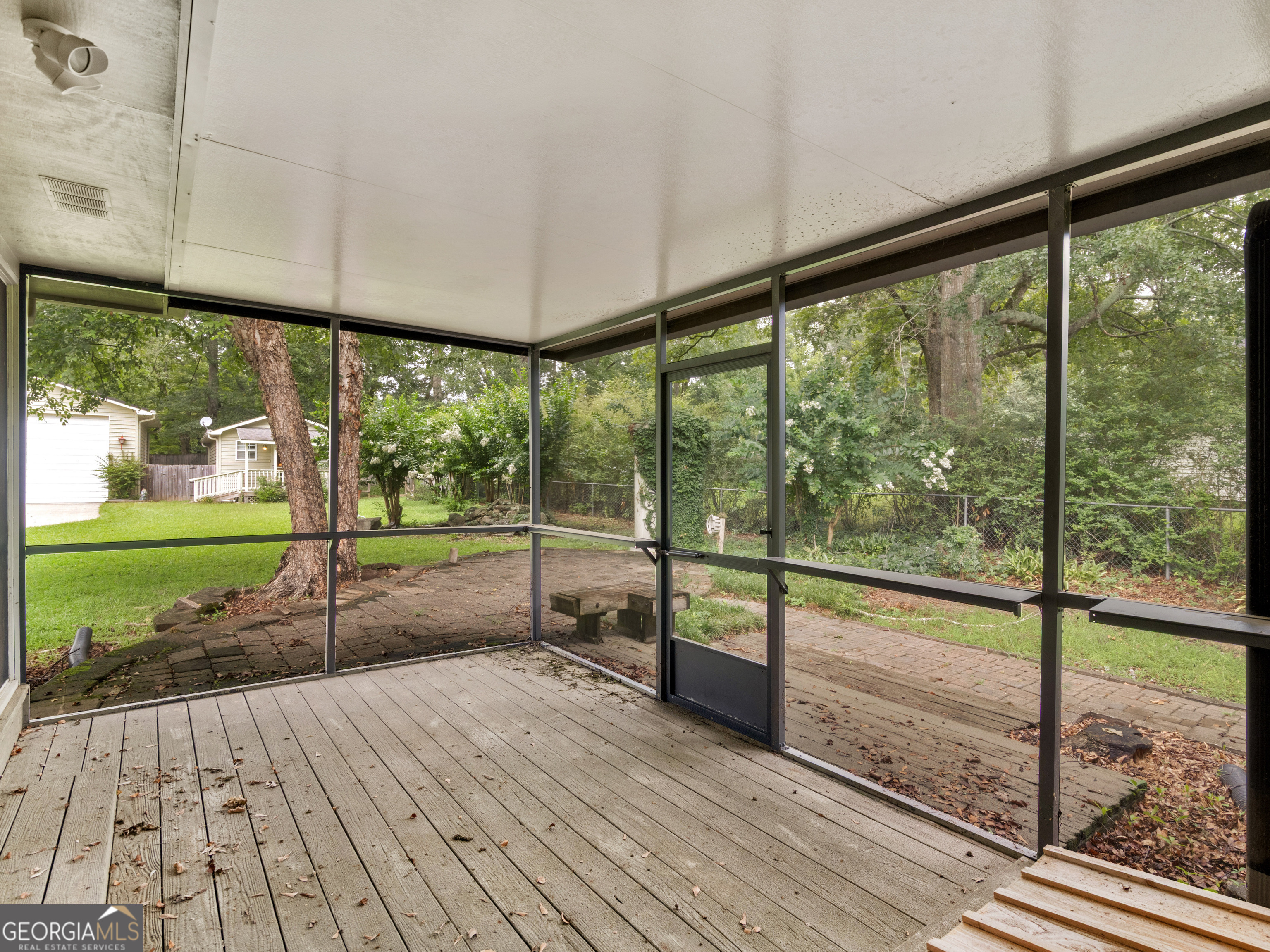 105 Zebulon Street Milner, GA 30257 - Photo 24 of 34 a view of a room with wooden floor and wooden floor