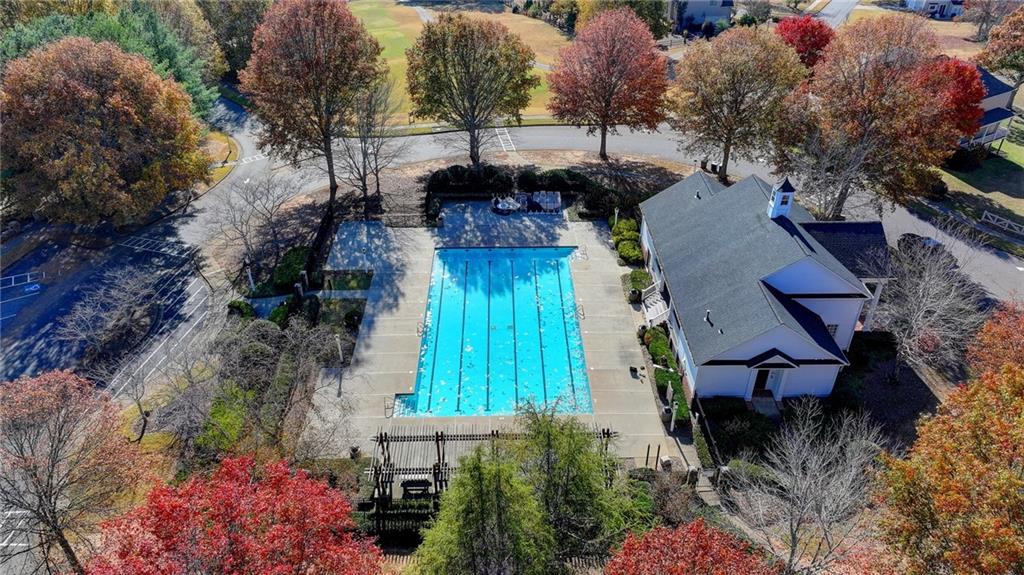 6415 Hampton Rock Lane Cumming, GA 30041 - Photo 25 of 26 an aerial view of a house with a yard and garden
