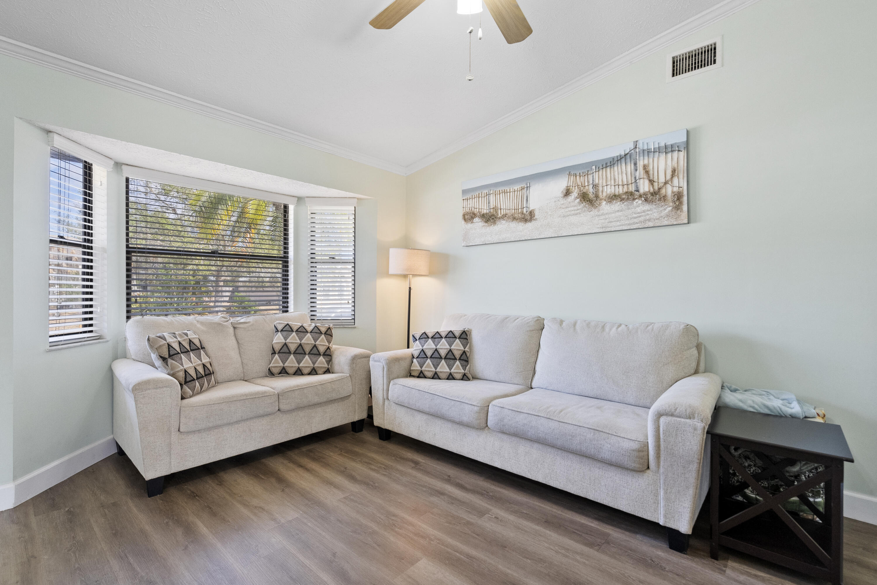 822 Southwest Harvard Road Port St. Lucie, FL 34953 - Photo 11 of 43 a living room with furniture and a large window