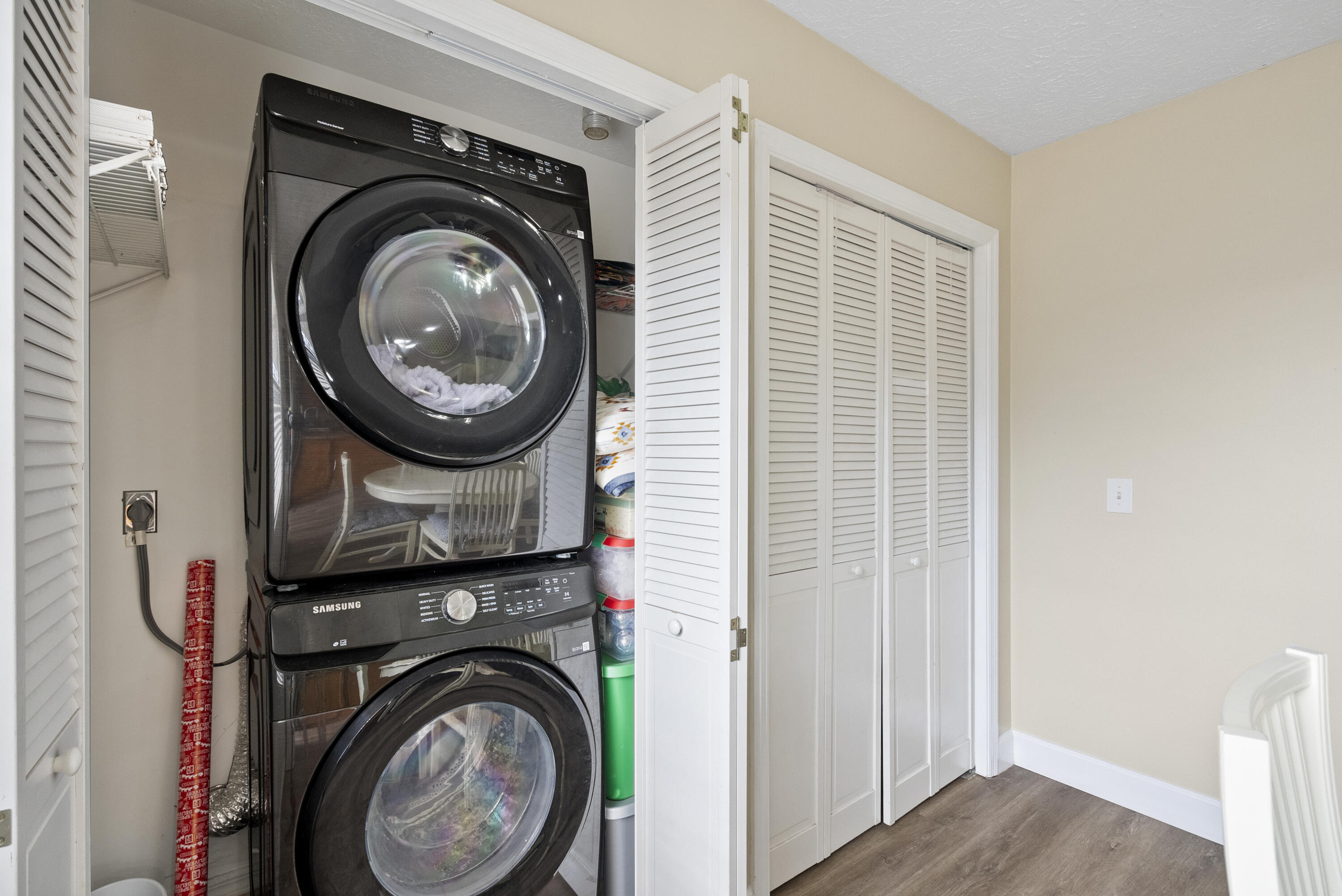 822 Southwest Harvard Road Port St. Lucie, FL 34953 - Photo 18 of 43 a view of a hallway with washer and dryer
