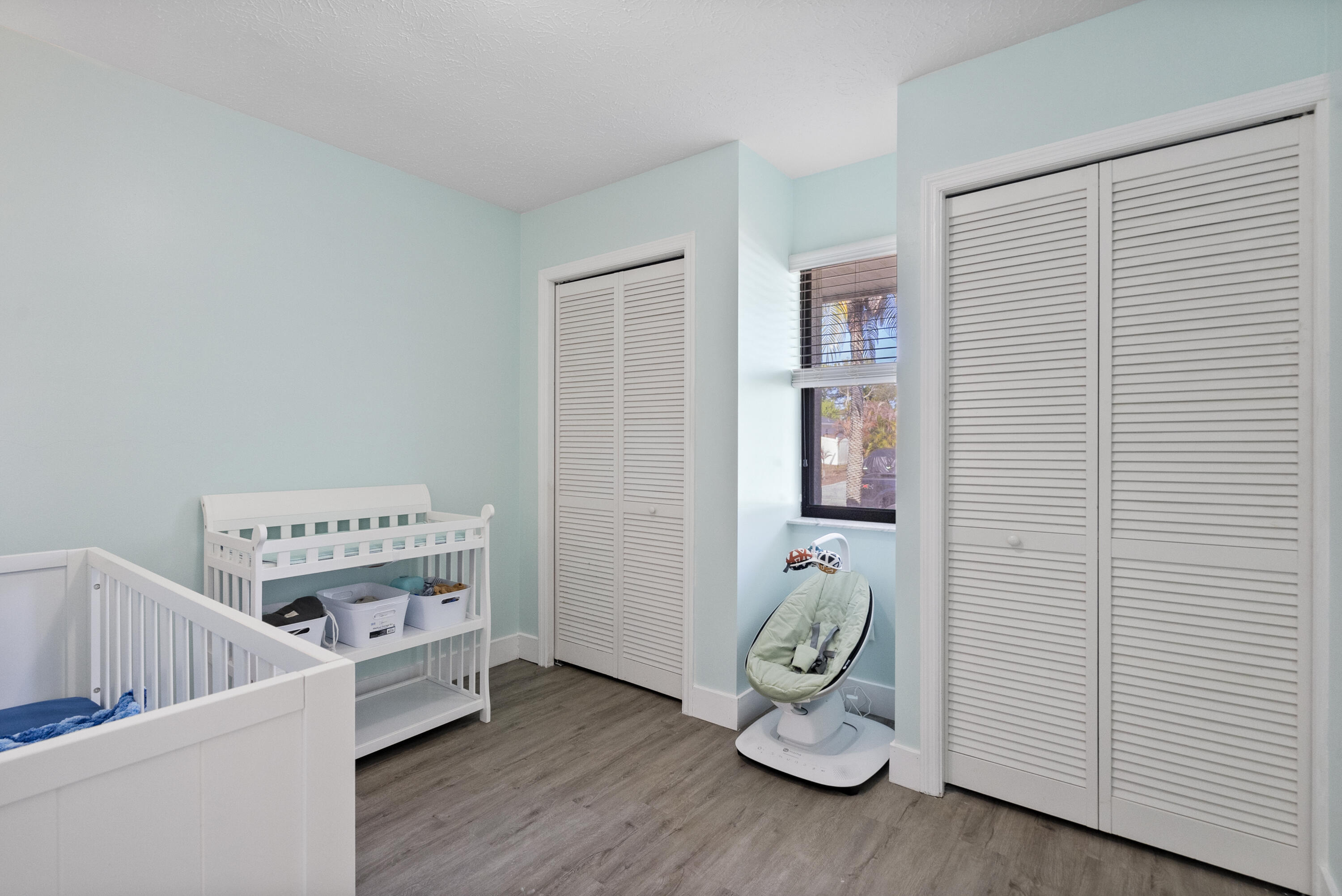 822 Southwest Harvard Road Port St. Lucie, FL 34953 - Photo 25 of 43 a room with furniture and wooden floor