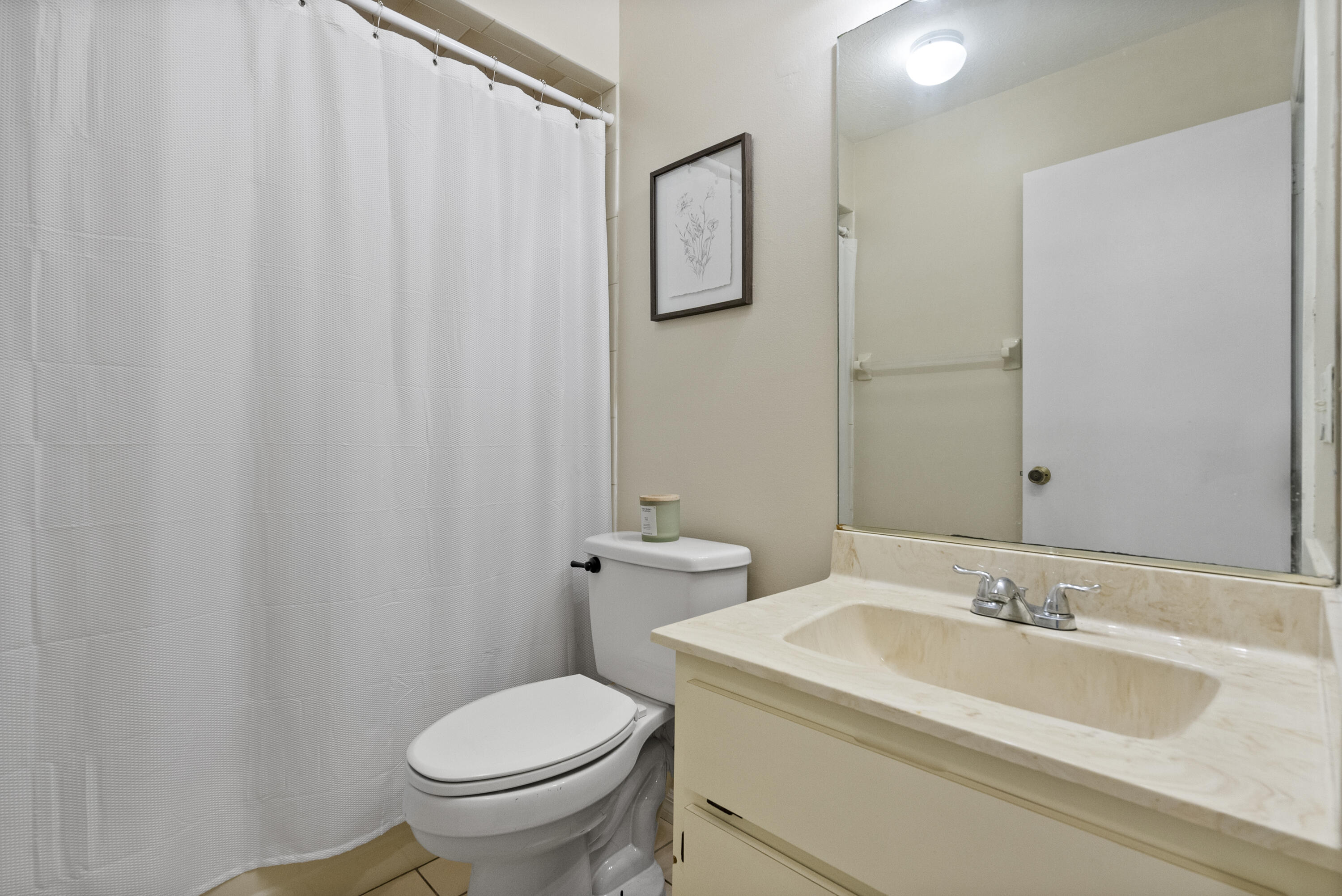 822 Southwest Harvard Road Port St. Lucie, FL 34953 - Photo 27 of 43 a bathroom with a sink and toilet