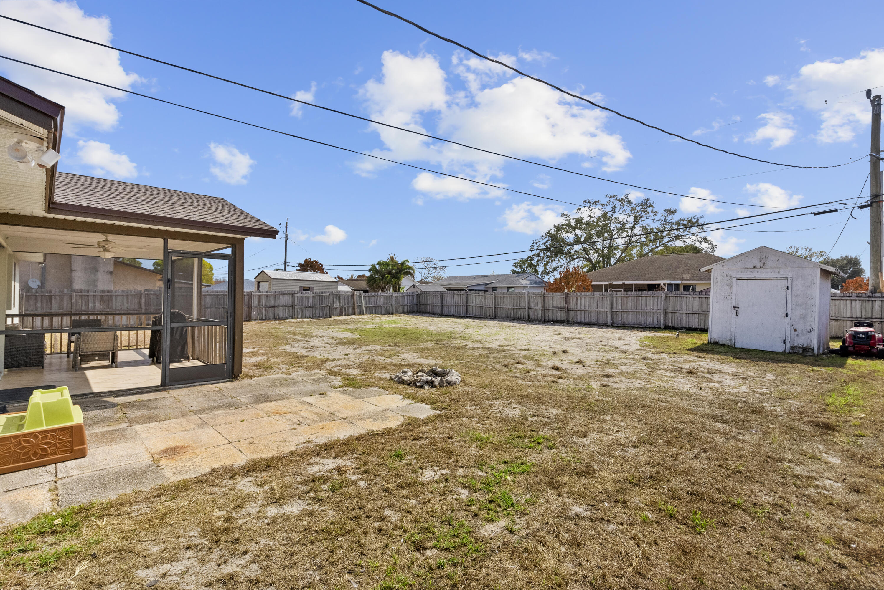 822 Southwest Harvard Road Port St. Lucie, FL 34953 - Photo 36 of 43 a view of a house with a yard