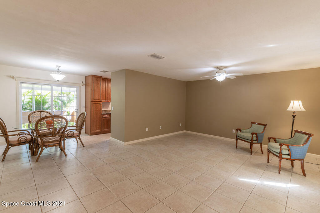 1063 Whitehurst Road Southwest Palm Bay, FL 32908 - Photo 6 of 20 a workspace with furniture and window