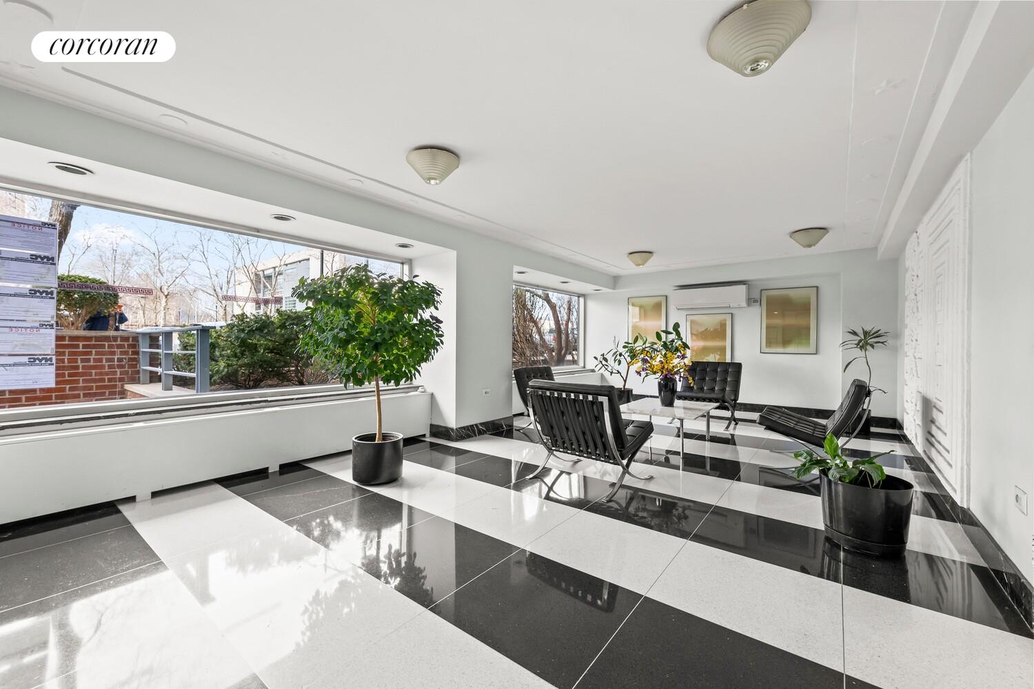 175 Adams Street, Unit 5H Brooklyn, NY 11201 - Photo 13 of 18 a view of living room filled with furniture and window