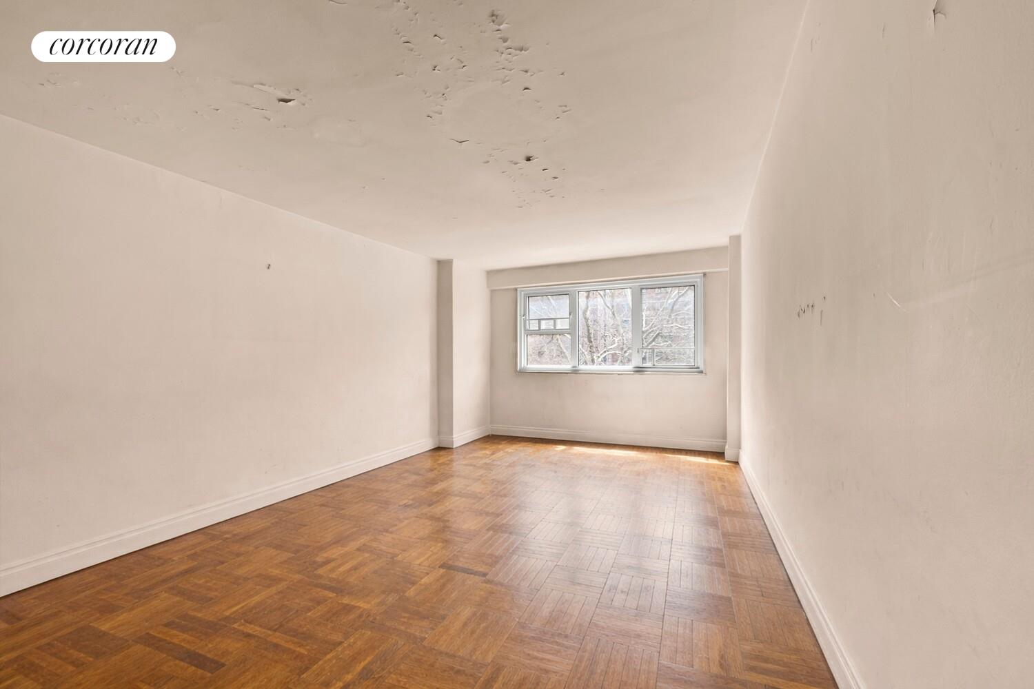 175 Adams Street, Unit 5H Brooklyn, NY 11201 - Photo 4 of 18 a view of an empty room with a window