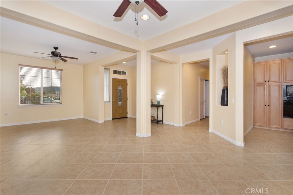 8172 Parry Drive Hemet, CA 92545 - Photo 47 of 47 Open floor plan for living room and dining room with view to the hallway and kitchen