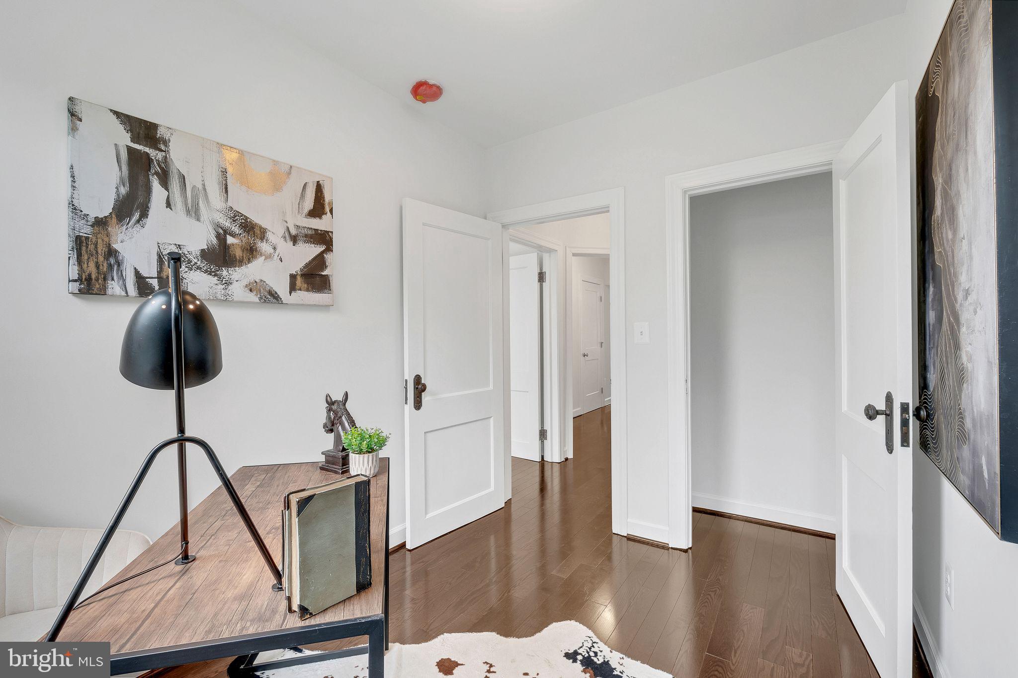 3009 20th Street Northeast Washington, DC 20018 - Photo 24 of 24 a view of hallway with furniture and wooden floor