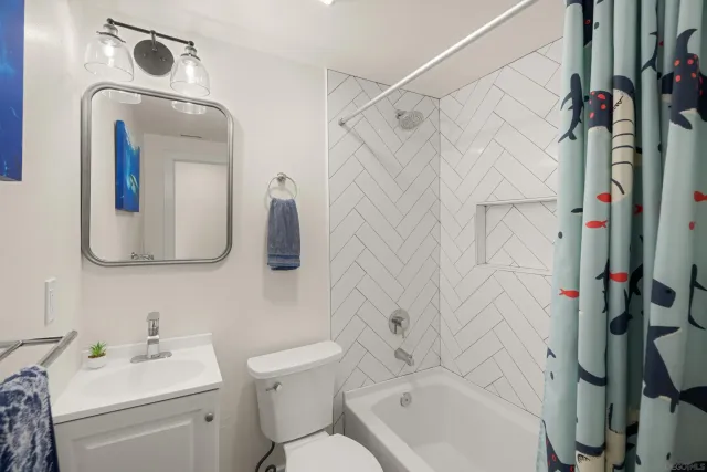 a view of a house with swimming pool and sitting area