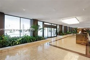 a view of a living room and garage