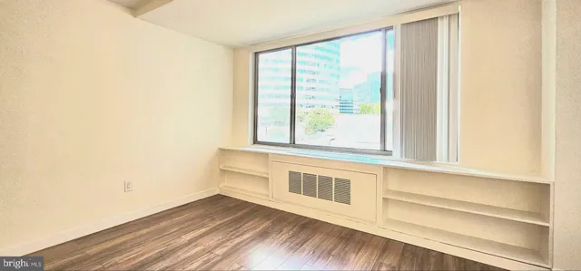 a bathroom with a sink a large mirror and shower