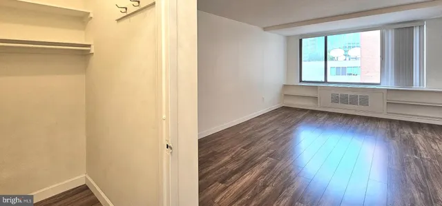 a view of a a dining room with furniture window and outside view
