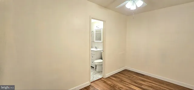 a bunch of flowers in front of building