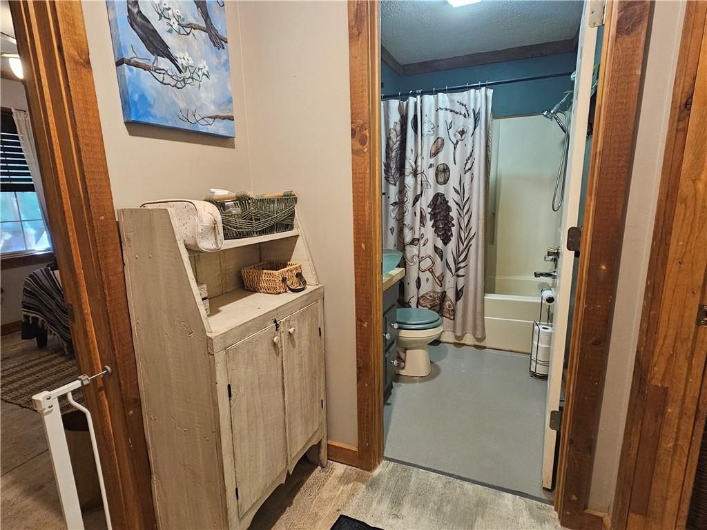 131 Chestatee Spgs Ridge Dahlonega, GA 30533 - Photo 24 of 51 a bathroom with a toilet and a shower