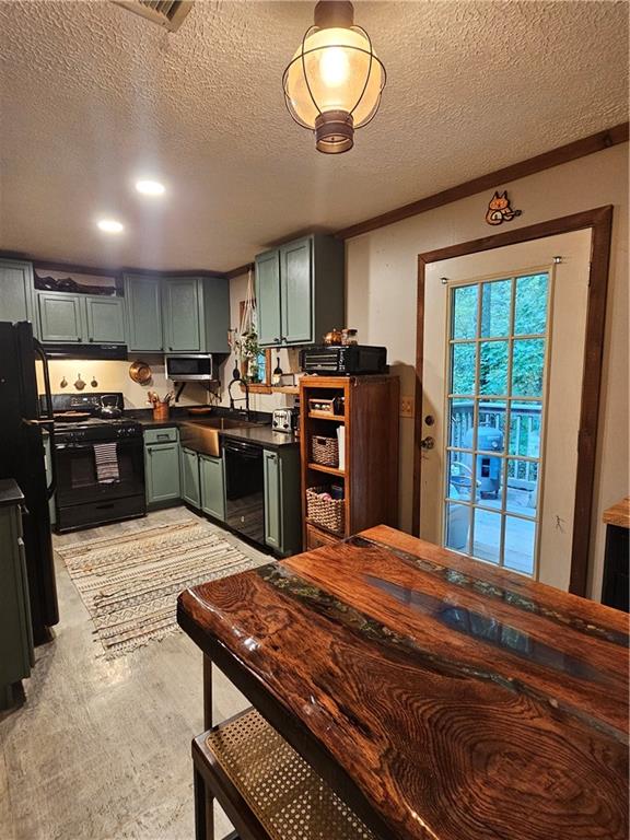 131 Chestatee Spgs Ridge Dahlonega, GA 30533 - Photo 37 of 51 a large kitchen with kitchen island a large island in the center