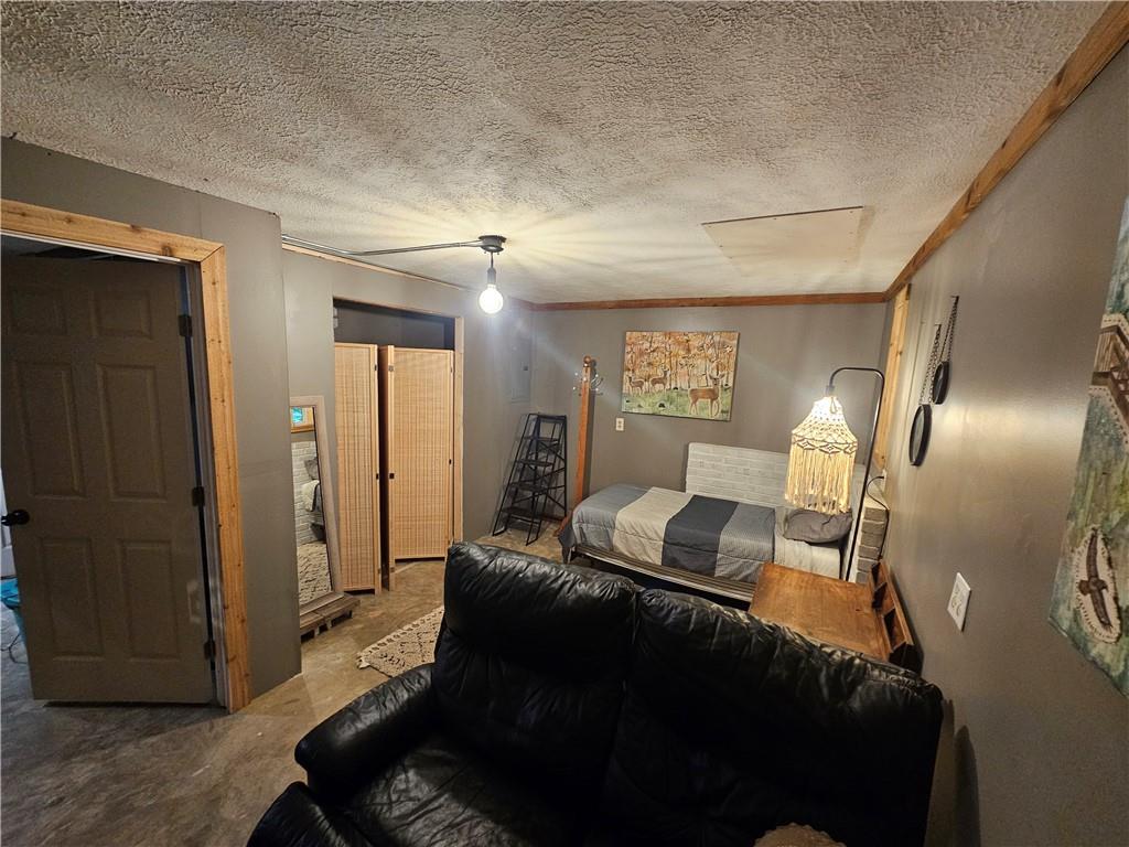 131 Chestatee Spgs Ridge Dahlonega, GA 30533 - Photo 43 of 51 a living room with furniture and wooden floor