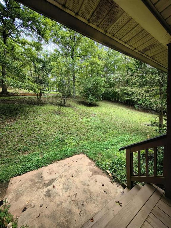 131 Chestatee Spgs Ridge Dahlonega, GA 30533 - Photo 46 of 51 a view of a backyard with a garden