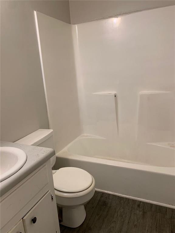 258 Walker Street Augusta, GA 30901 - Photo 13 of 16 a bathroom with a toilet a sink and a bathtub