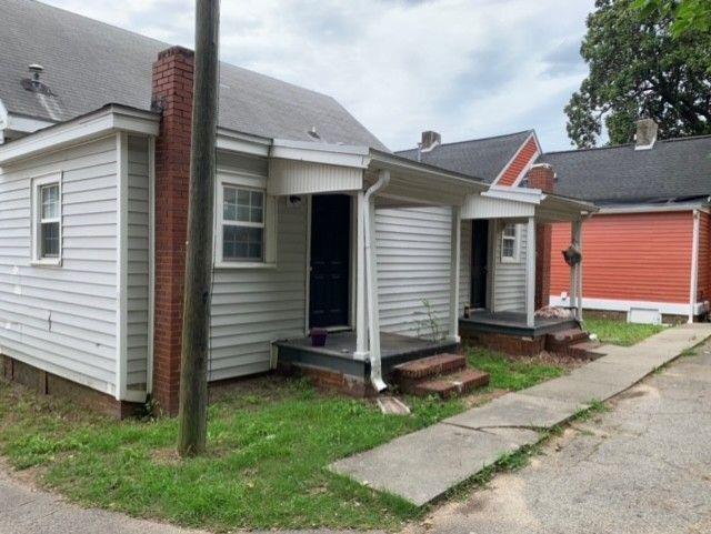 258 Walker Street Augusta, GA 30901 - Photo 16 of 16 a front view of a house with garden