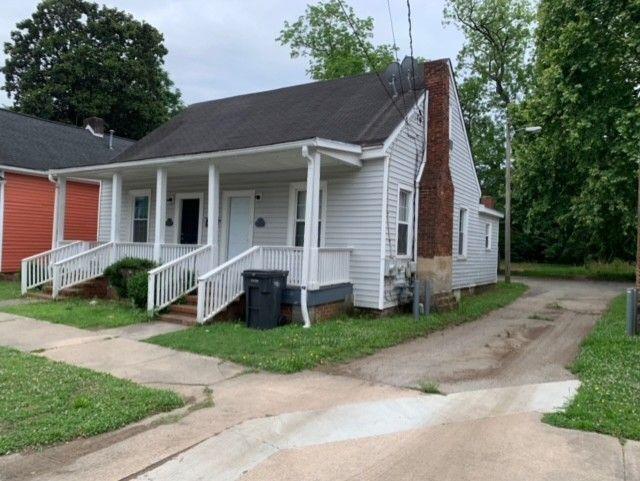 258 Walker Street Augusta, GA 30901 - Photo 4 of 16 a view of a house with a yard and large tree