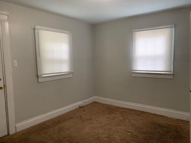 258 Walker Street Augusta, GA 30901 - Photo 8 of 16 an empty room with a window