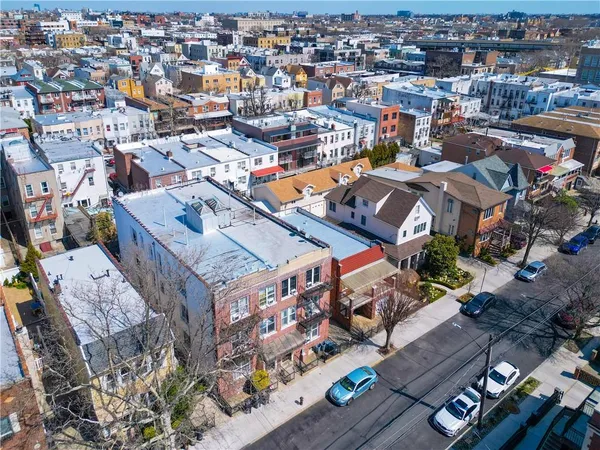 an aerial view of a city with lots of residential buildings